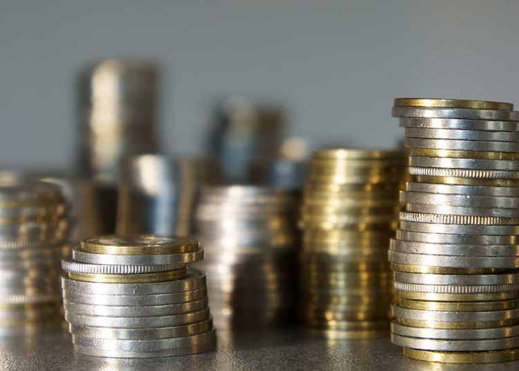 Mehrere nebeneinander angeordnete Münzstäbe sind zu sehen.