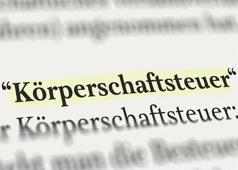 Auszug aus einem Textabschnitt, der Begriff "Körperschaftsteuer" ist hervorgehoben.